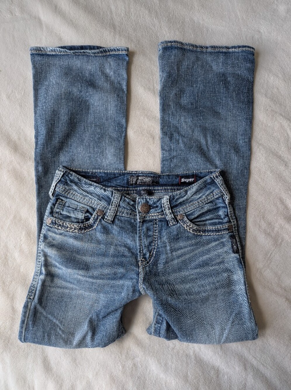 early 2000's low waisted bootcut silver jeans